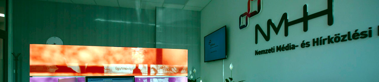 On this picture: the NMHH logo and a smart television in the customer service office of the NMHH